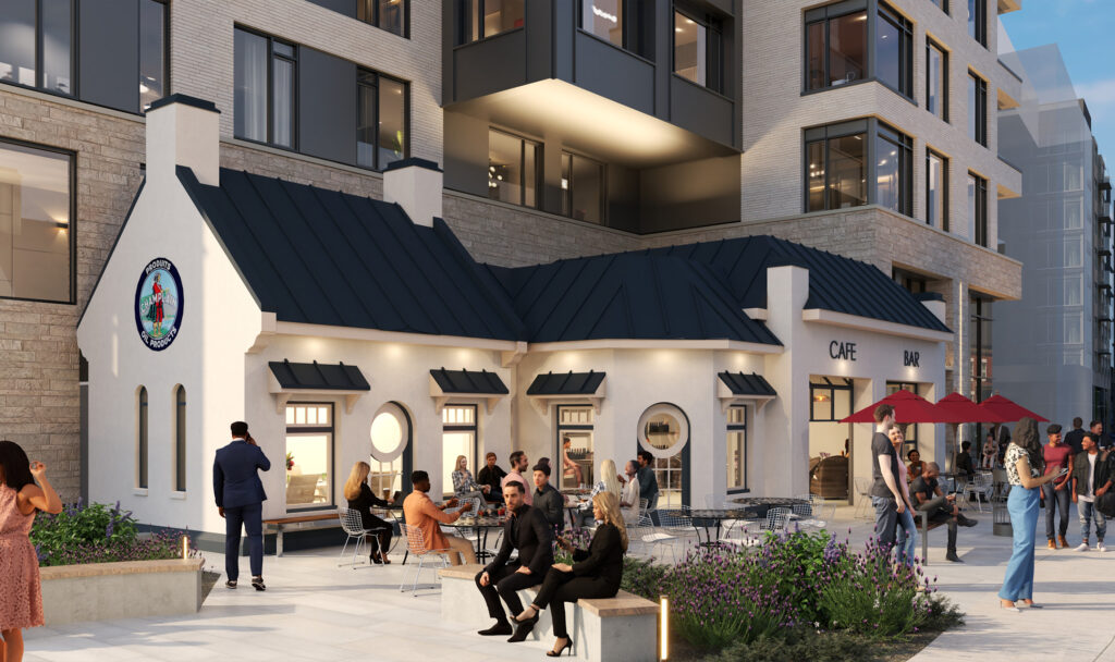 People sitting together outside a black and white building.
